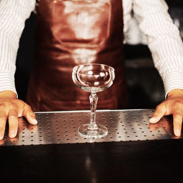 Hand, Alcohol, Glass, Drink, Photography, Finger, Wine glass, Stemware, Drinkware, Table, 