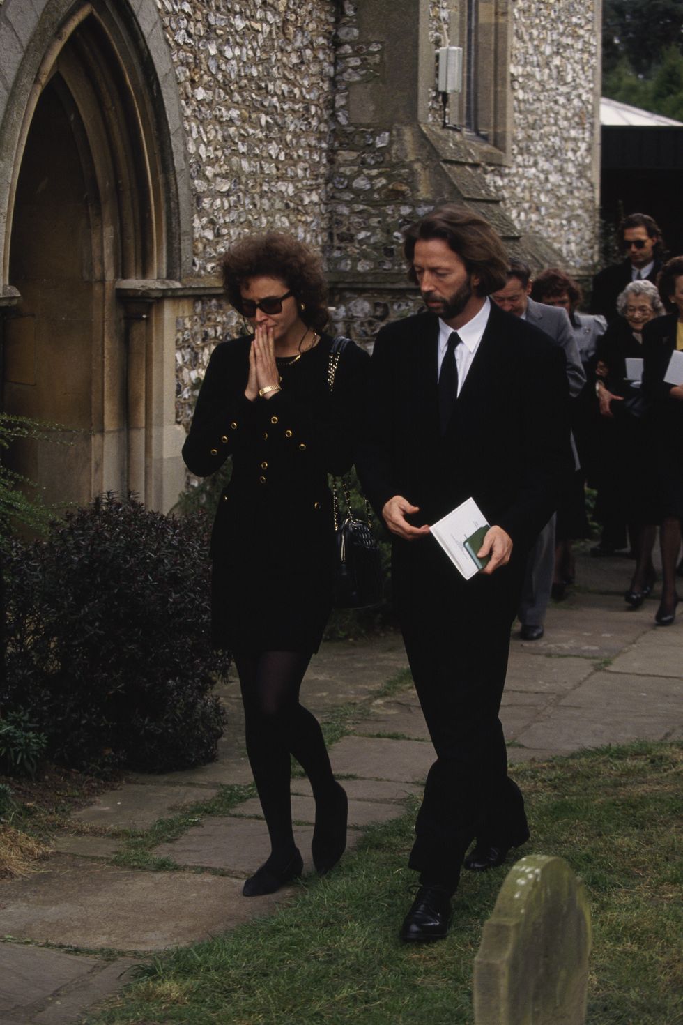 Lory del Santo and Eric Clapton attend the funeral of their son, Conor, in Ripley, United Kingdom