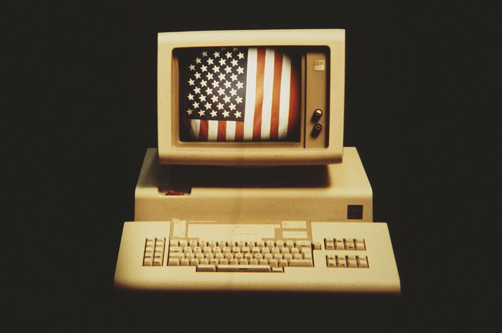 an american flag on the monitor of an ibm computer, 1983 photo by alfred gescheidtgetty images