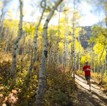 man running on the trails in park city, utah