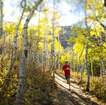 man running lifestyle on the trails in park city, utah