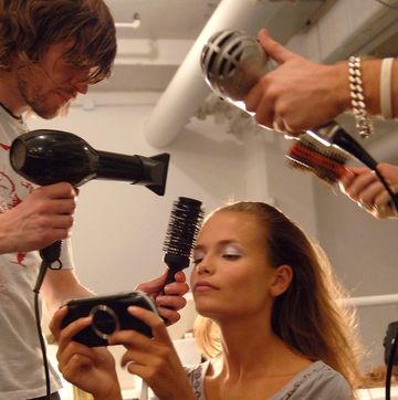 a person getting the hair done