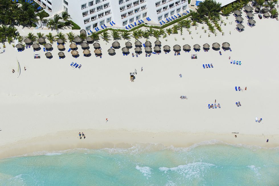 Cancun beach with sunbathers