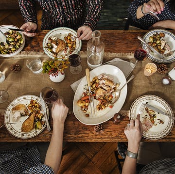 Group of people eating thanksgiving dinner