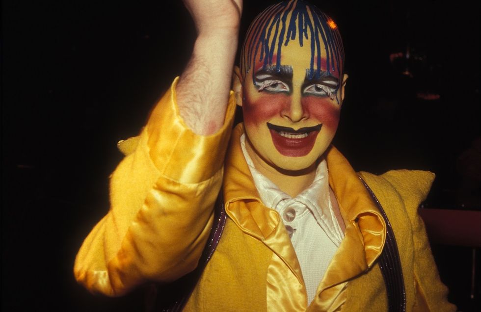 Face, Yellow, Head, Nose, Clown, Fun, Smile, Performing arts, Gesture, Thumb, 