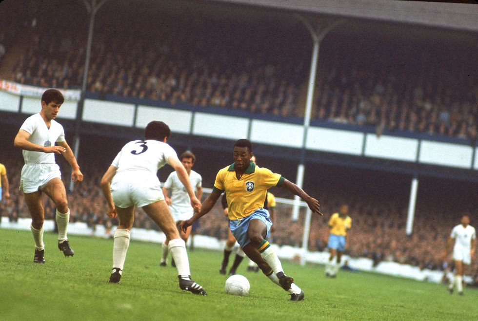 pele in yellow jersey on the ball for brazil during a group stage match against bulgaria at goodison park during the 1966 world cup tournament in liverpool england