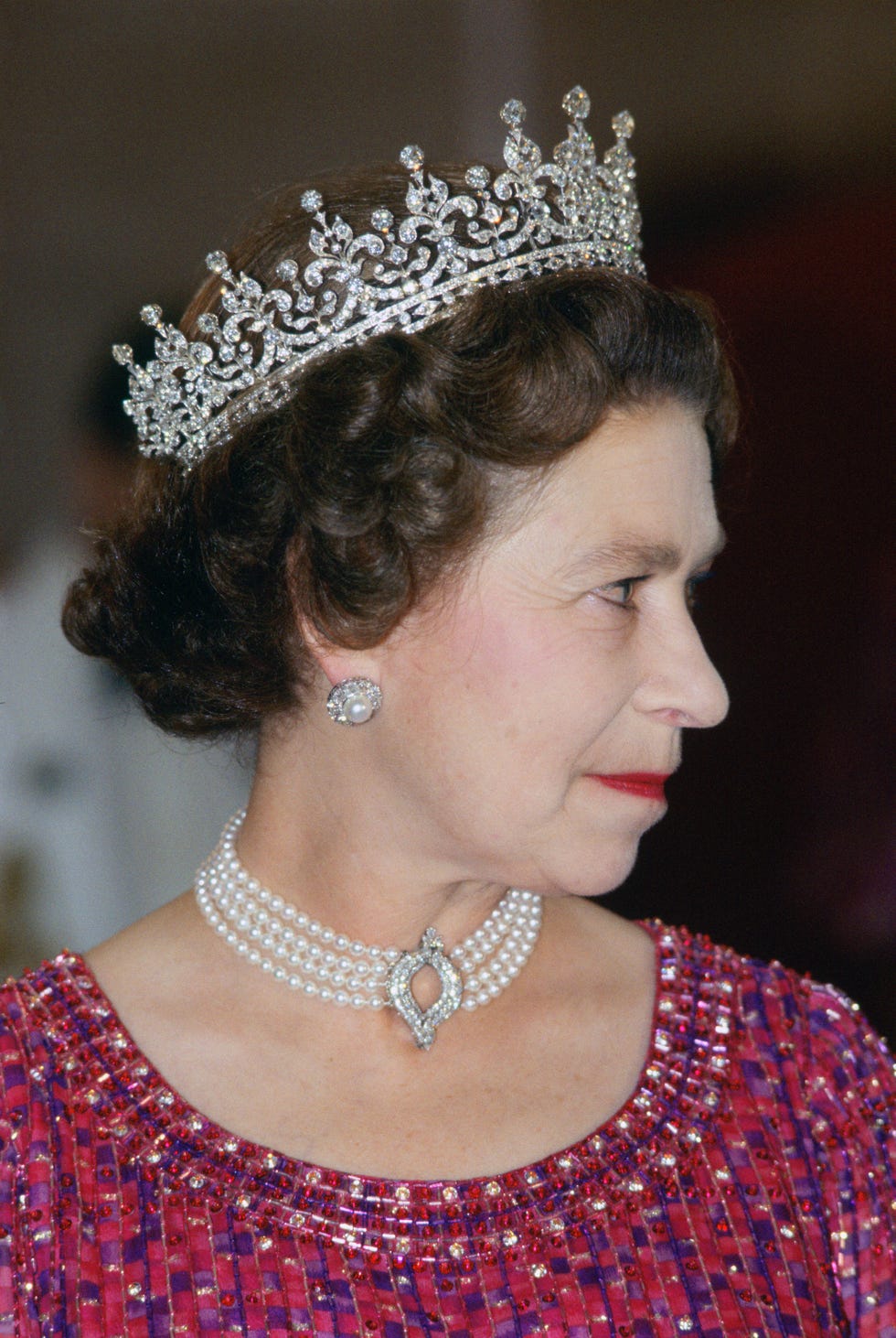 bangladesh   november 16  queen elizabeth ii wears a four strand diamond and pearl choker with grannys tiara to an engagement in bangladesh  photo by tim graham photo library via getty images