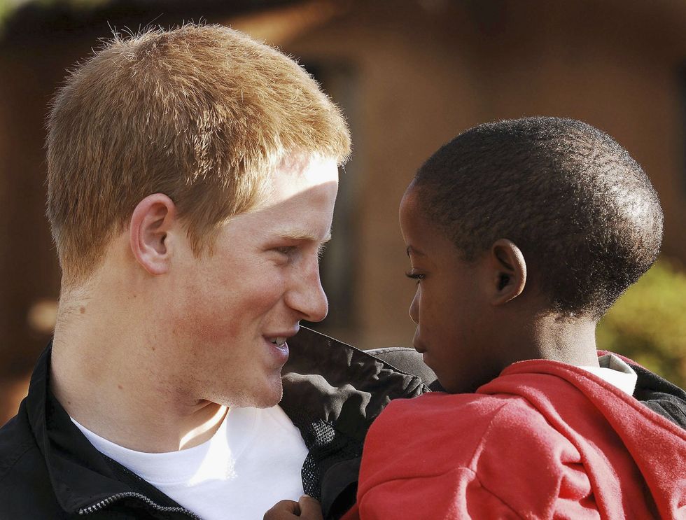 Prince Harry invited an orphan he met in Africa 14 years ago to his wedding