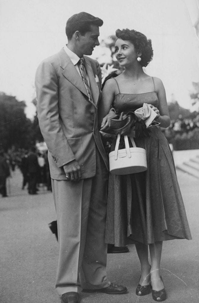 Photograph, Vintage clothing, Standing, Retro style, Snapshot, Suit, Formal wear, Black-and-white, Dress, Classic, 