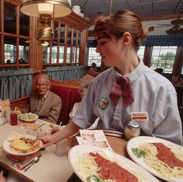 a waitress serves customers at the bob evans farm restaurant