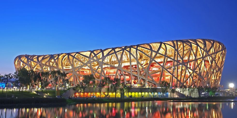 beijing national stadium with lights at night