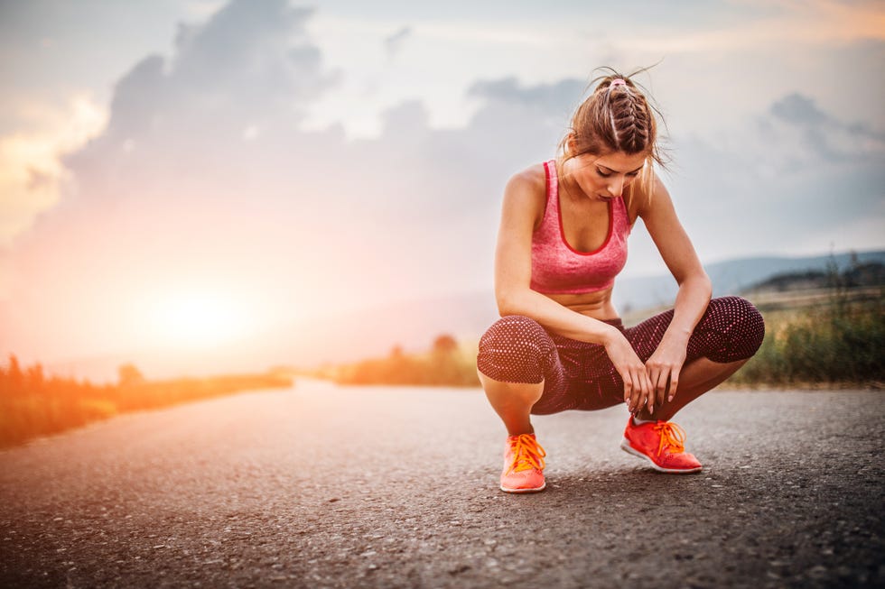 tired runner woman making a break