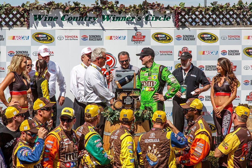 june 28, 2015 sonoma raceway president, steve page congratulates kyle busch in the winnwers circle after the toyota savemart 350 nascar sprint cup series race held june 26 28, 2015 at sonoma raceway, ca driver kyle busch 18 won the 110 lap race photo by allan hamiltonicon sportswirecorbisicon sportswire via getty images