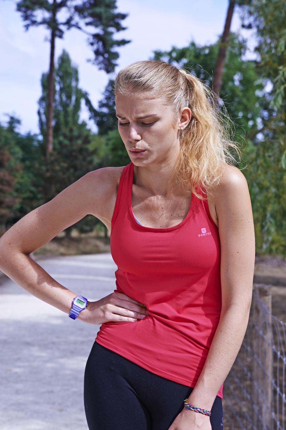 jogger suffering from a side stitch photo by  bsipuniversal images group via getty images