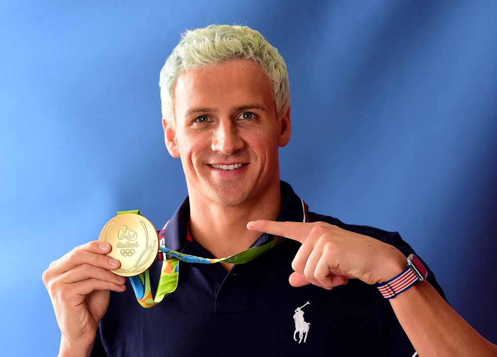 rio de janeiro, brazil   august 12  broadcast   out swimmer, ryan lochte of the united states poses for a photo with his gold medal on the today show set on copacabana beach on august 12, 2016 in rio de janeiro, brazil  photo by harry howgetty images