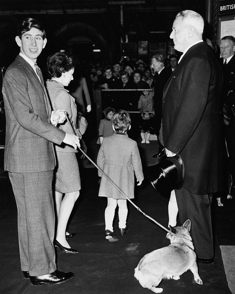 prince charles holding a pet corgi on a leash, with princess margaret and her son viscount linley in the background, arriving at liverpool street station, london, december 30th 1966 photo by roger jacksoncentral pressgetty images