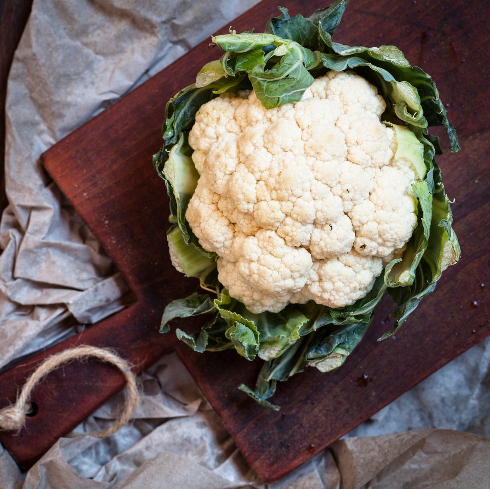 White cauliflower on chopping board cauliflower