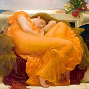 woman lying on a couch woman lying on a couch