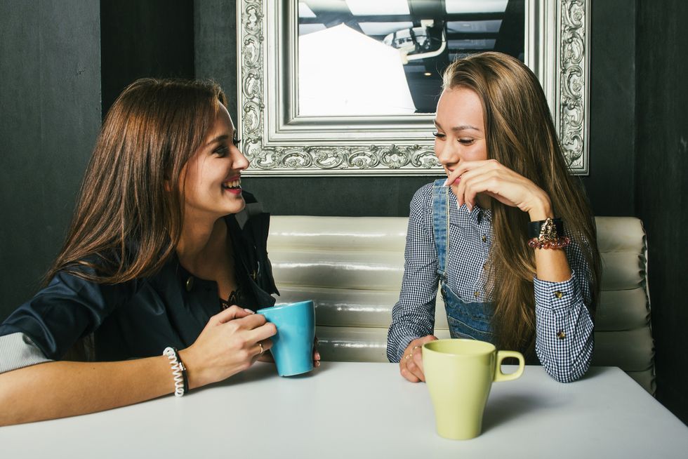 women talking in coffee shop