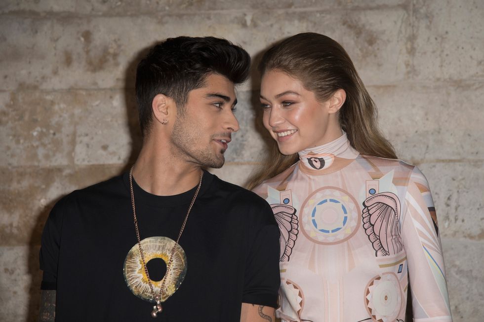 paris, france october 02 zayn malik and gigi hadid attend the givenchy show as part of the paris fashion week womenswear springsummer 2017 on october 2, 2016 in paris, france photo by dominique charriauwireimage