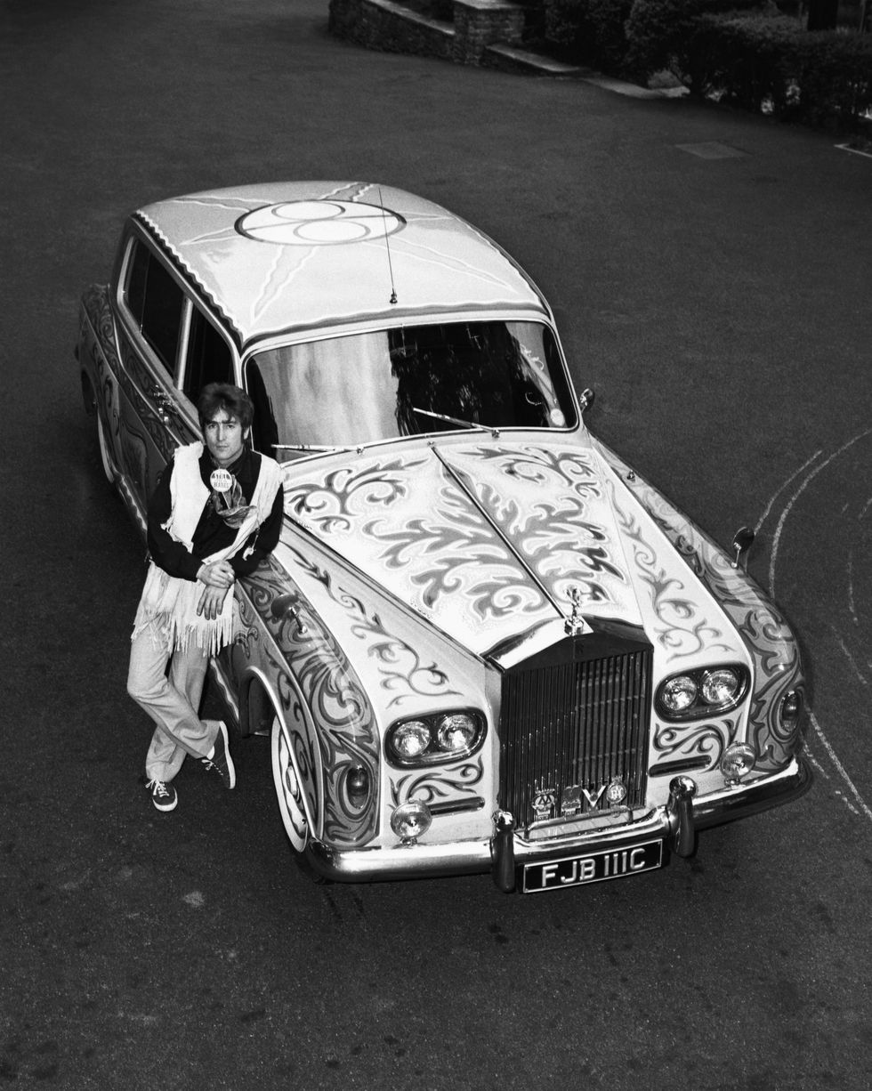 the beatles star john lennon shows off his psychedelic rolls royce, circa 1967 photo by © hulton deutsch collectioncorbiscorbis via getty images