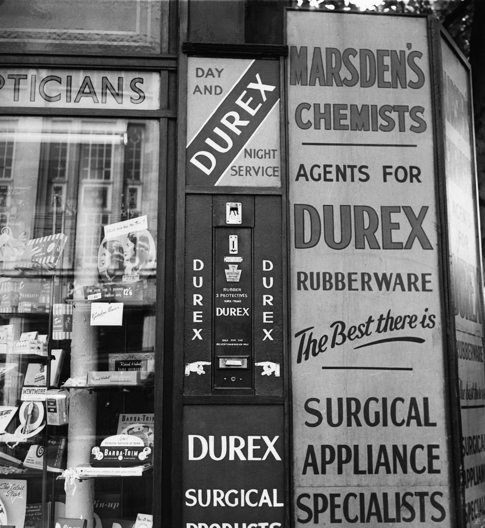 a durex condom machine outside a chemists shop photo by © hulton deutsch collectioncorbiscorbis via getty images