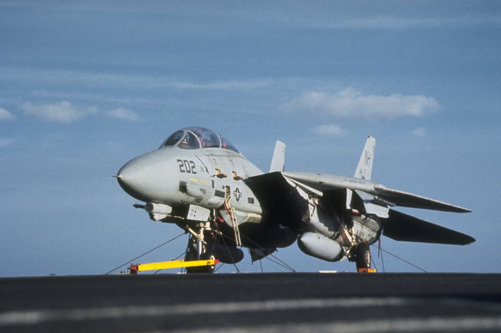 a fighter squadron 213 vf 213 f 14a tomcat aircraft sits on the flight deck of the nuclear powered aircraft carrier uss abraham lincoln cvn 72 photo by © corbiscorbis via getty images