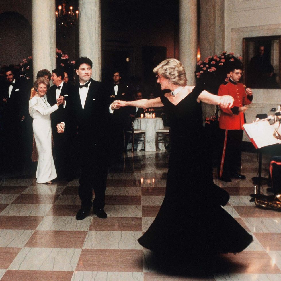 file photo princess diana dances with actor john travolta in a dress designed by victor edelstein, whilst attending a state dinner at the white house on the fifth anniversary of princess dianas death her loss is mourned by many people among them the fashion designers whose creations she wore with great style photo by © pool photographcorbiscorbis via getty images