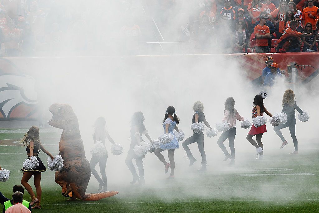 This Broncos Cheerleader Dressed as a T-Rex Won Halloween