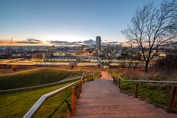 the skyline of sheffield city centre seen from south street park above the citys main rail station, south yorkshire, england uk