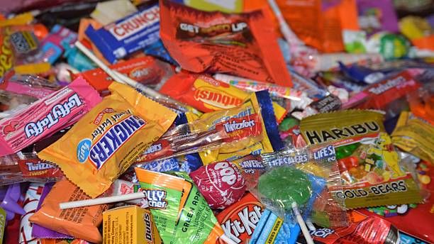 How much candy do Americans eat in a whole year?