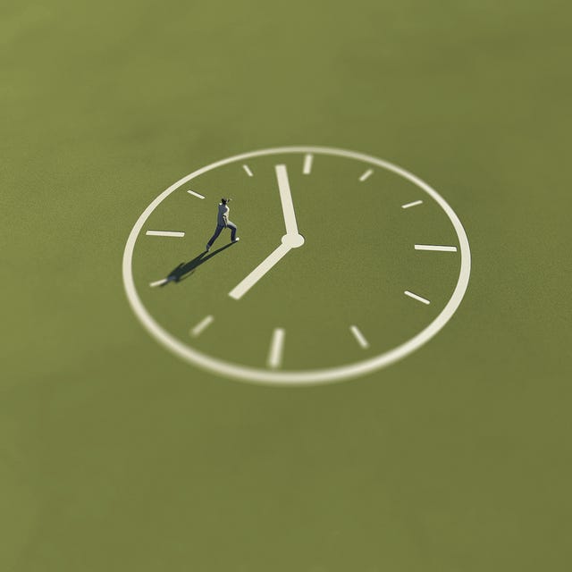 a runner on a large clock face symbolizing time management or the passage of time