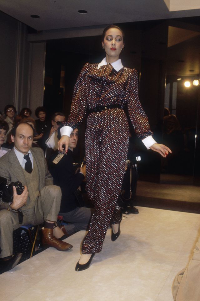 a fashion model wears a haute couture pantsuit with a white collar and cuffs by french fashion designer hubert de givenchy she modeled the suit during his spring summer 1981 fashion show photo by pierre vautheysygmasygma via getty images