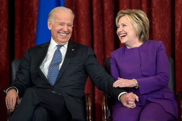 us vice president joe r biden l and former secretary of state hillary clinton laugh during a portrait unveiling for outgoing senate minority leader senator harry reid d nv on capitol hill december 8, 2016 in washington, dc  afp  brendan smialowski        photo credit should read brendan smialowskiafp via getty images