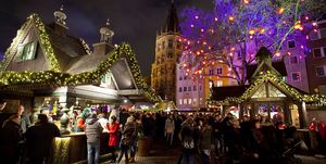 Night, Landmark, Light, Lighting, Sky, Christmas lights, Crowd, Public space, Purple, Tree, 