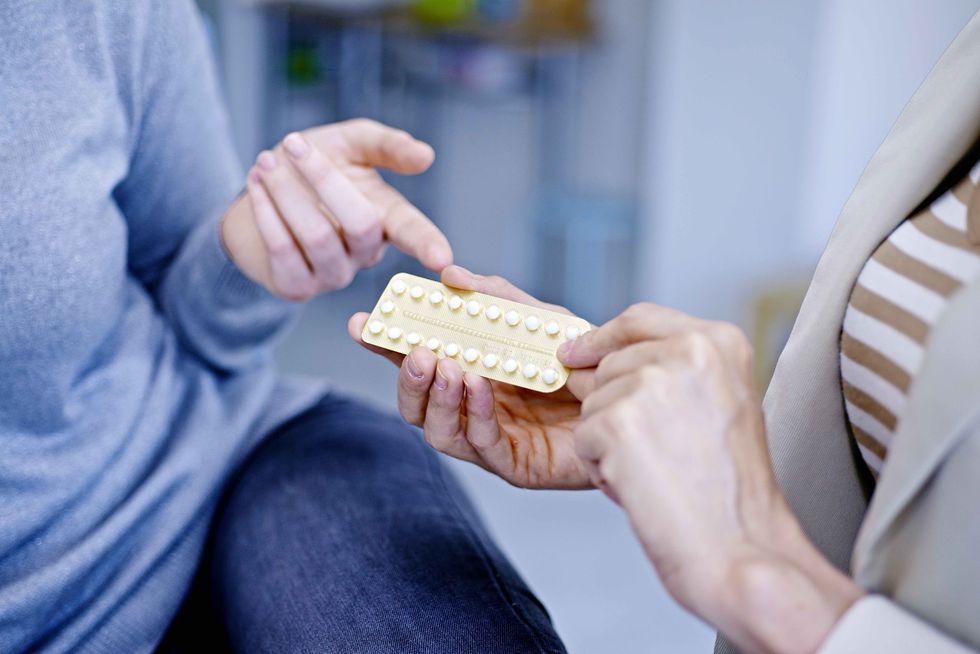 doctor discussing oral contraception with a patient