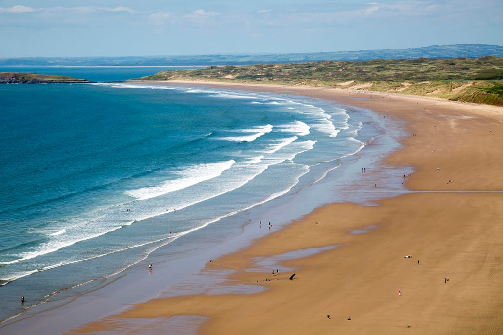 rhossili beach, gower peninsula, near swansea, south wales, uk photo by geography photosuniversal images group via getty images