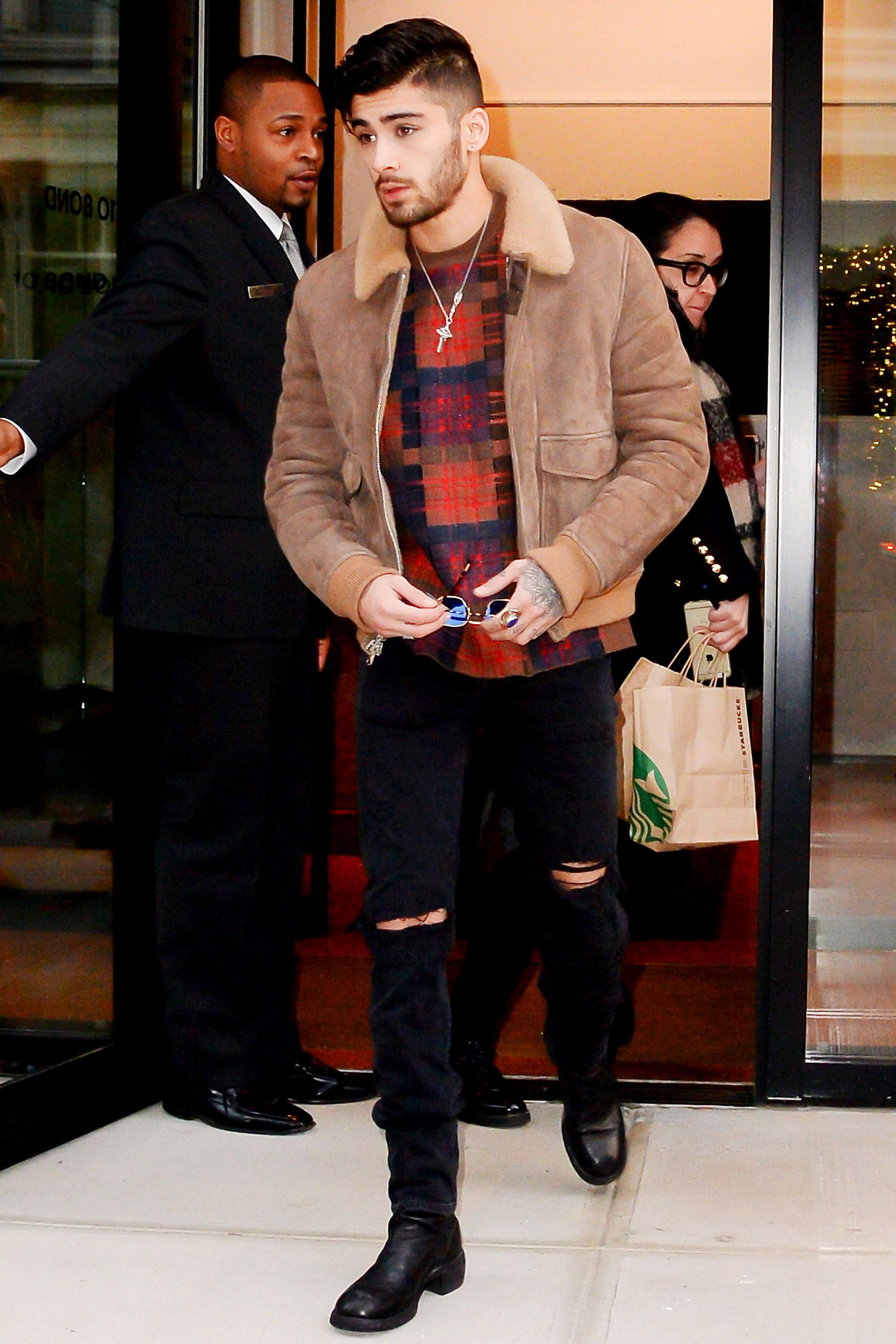 Zayn Malik Wears Tommy Jeans Jacket at LAX Airport | Teen Vogue