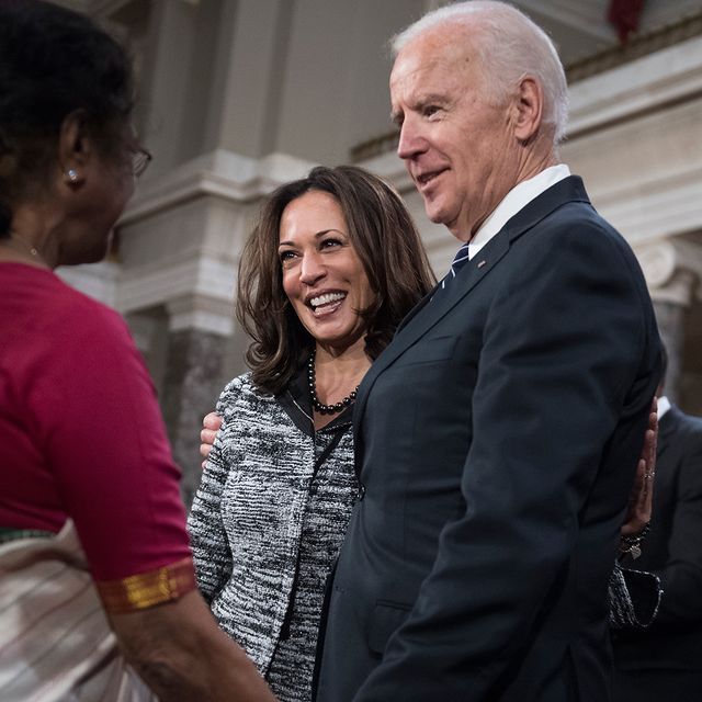 Joe Biden talks with Kamala Harris and her aunt, Dr. Sarala Gopalan, during a swearing-in ceremony in the Capitol's Old Senate Chamber, January 3, 2016.