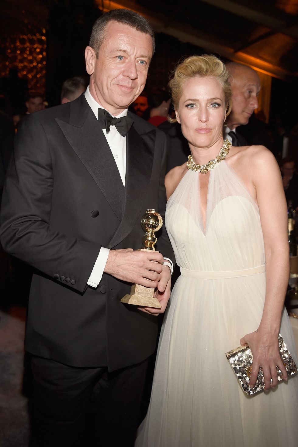 Peter Morgan and actress Gillian Anderson attend The Weinstein Company and Netflix Golden Globe Party in January 2017 