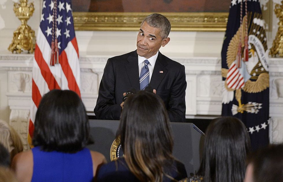 washington, dc january 12 afp out us president barack obama looks at his wife michelle and his daughters malia and sasha during an event in the state dining room of the white house, january 12, 2017 in washington, dc obama presented the medal of freedom to vice president joe biden photo by olivier douliery poolgetty images