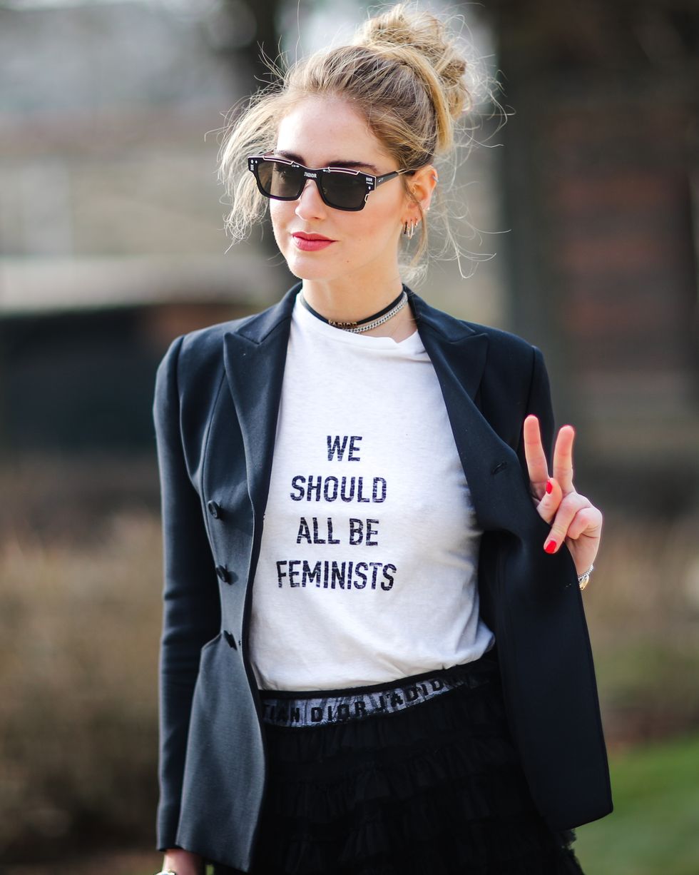 paris, france   january 23  chiara ferragni wears sunglasses, a black blazer jacket, a white t shirt with the inscriptions  we should all be feminists, a black meshed dress, black heels, and attends the christian dior haute couture spring summer 2017 show as part of paris fashion week, at the rodin museum, on january 23, 2017 in paris, france  photo by edward berthelotgetty images