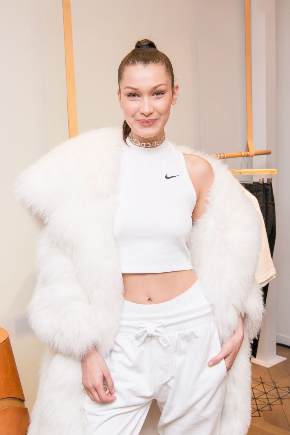 White, Clothing, Fashion, Outerwear, Fur, Abdomen, Muscle, Crop top, Trunk, Costume, 