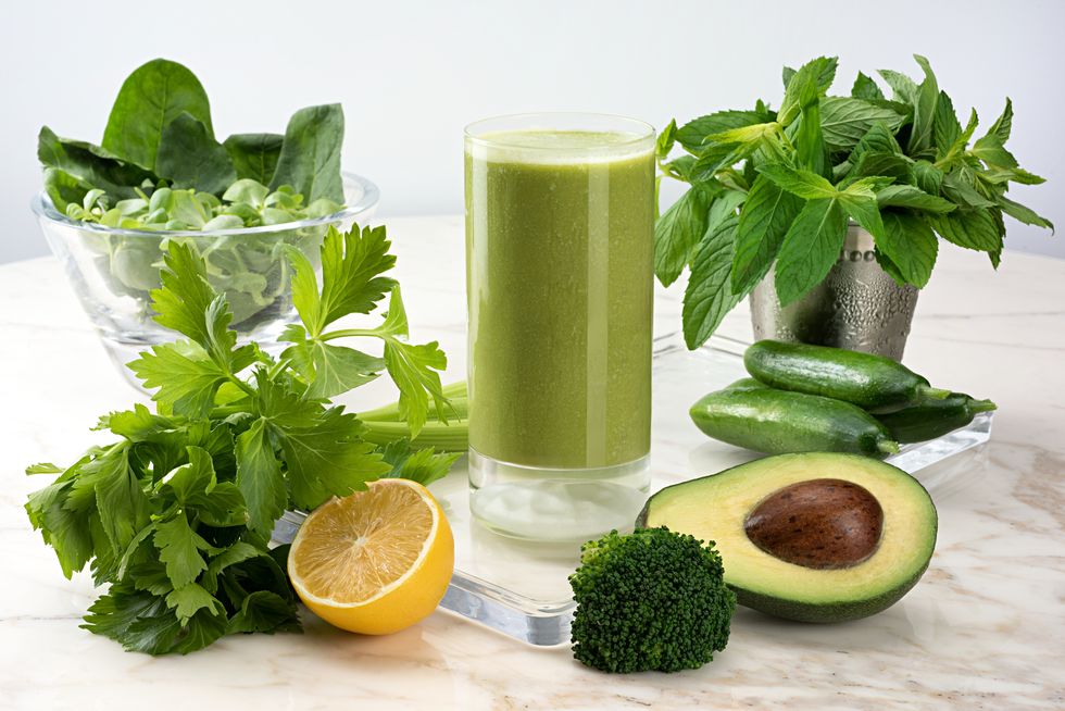 green juice with spinach, avocado,brocoli, lemon, cucumber, parsley