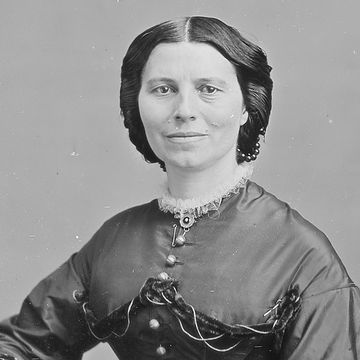 clara barton looking ahead and smiling for a photo