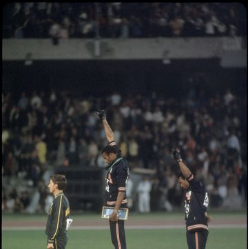 12 27 oct 1968  tommy smith 307 1st place and john carlos 259 3rd place of the us raise their fists in the black power salute during the playing of the national anthem at the olympics in mexico city, mexicophoto  © rich clarkson  rich clarkson  associates