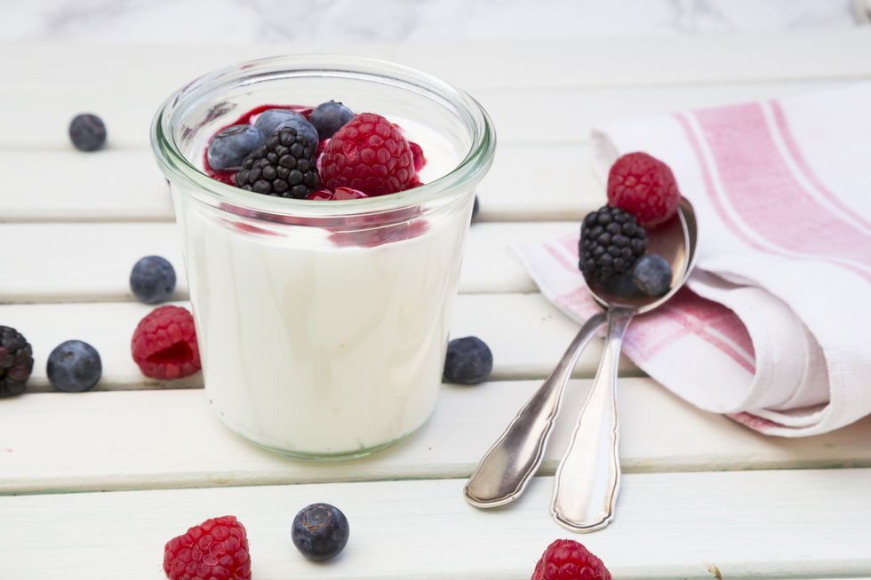 Glass of Greek yogurt with berries