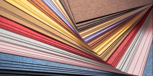 Multi Colored Background of Paper Pile