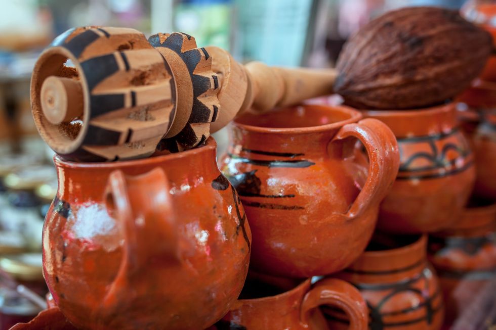 cacao fruit, cacao seed, ​and chocolate preparation utensils

from the cacao fruit the clay glasses with the mexican wood mouline the wood stick on top