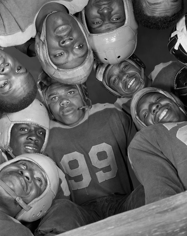 low angle view of football players in huddle, bethune cookman college, daytona beach, florida, usa, gordon parks for office of war information, january 1943 photo by universal history archiveuniversal images group via getty images
